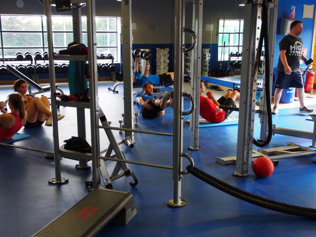 My Functional Training class suffers in solidarity during a “relaxing break” (LOL nope) that consists of ab sits. 